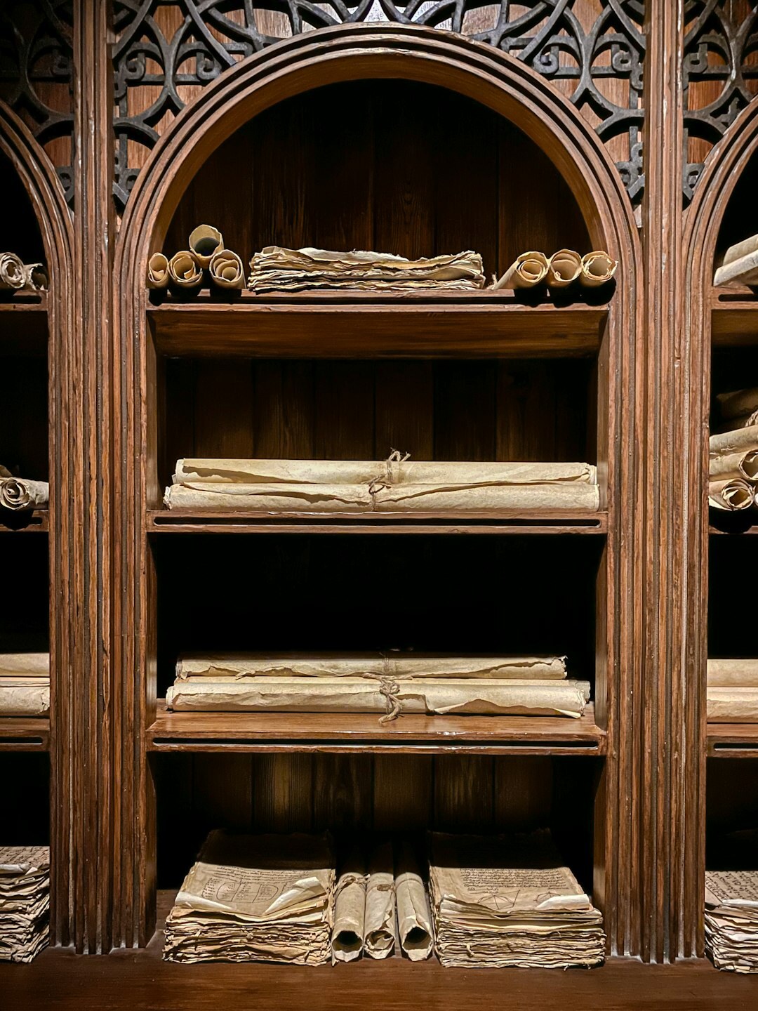 Wooden archive room filled with old books and historical documents